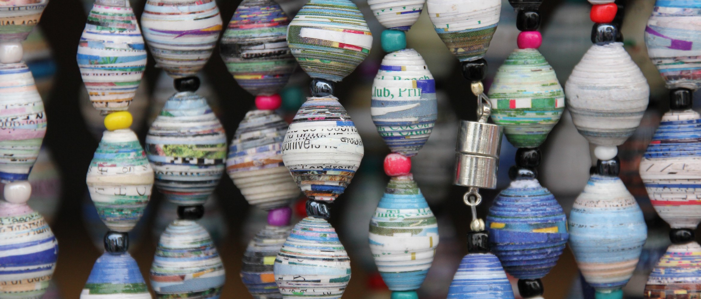 Used paper has been recycled and repurposed to craft environmentally friendly sustainable hanging decorations